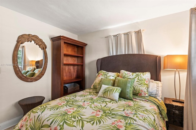 bedroom with baseboards
