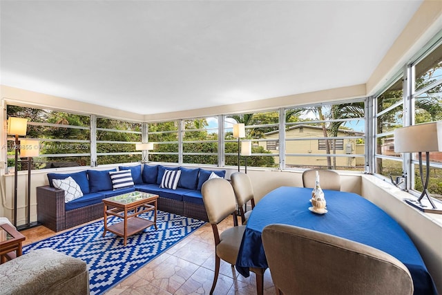 sunroom / solarium with an outdoor living space