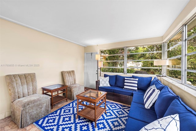 living room with plenty of natural light