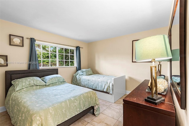 bedroom with baseboards