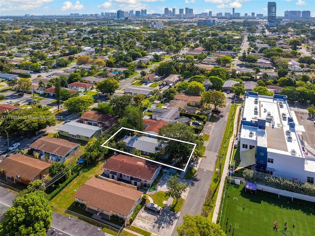 birds eye view of property with a view of city