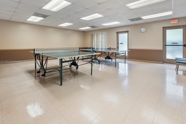 rec room with a drop ceiling