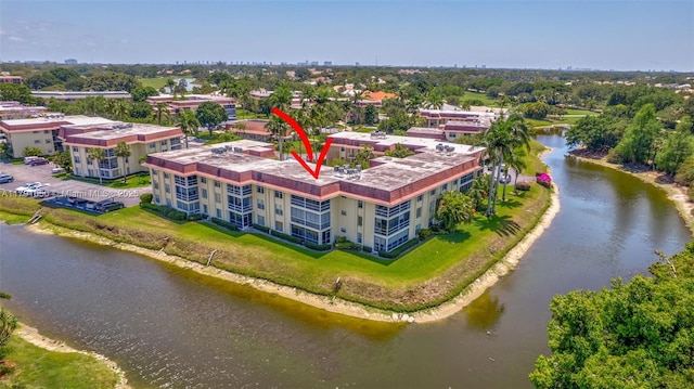 bird's eye view with a water view