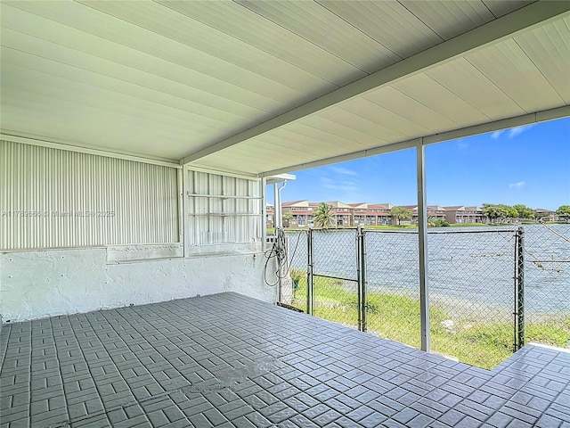 unfurnished sunroom featuring a residential view