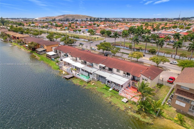 aerial perspective of suburban area with a water and mountain view