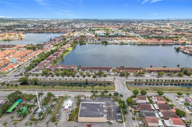 aerial view of property's location featuring a large body of water