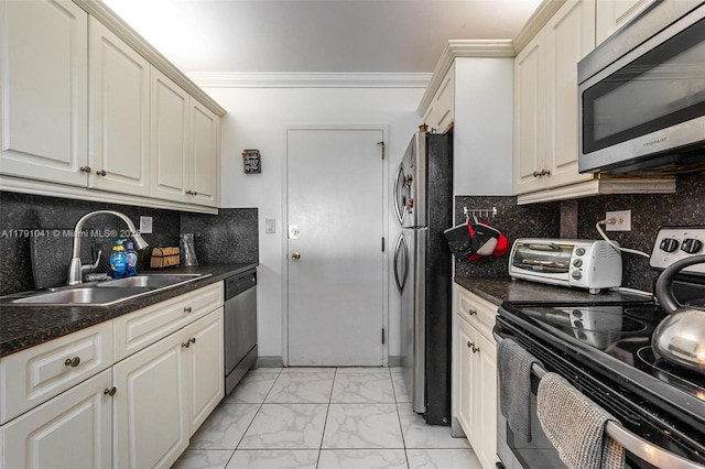 800 NE 195th St Unit 518, Miami, FL 33179 - kitchen featuring a sink, stainless steel appliances, marble finish floor, a toaster, and dark countertops