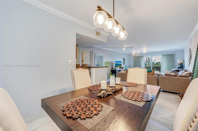 800 NE 195th St Unit 518, Miami, FL 33179 - dining room with a chandelier, ornamental molding, track lighting, and visible vents