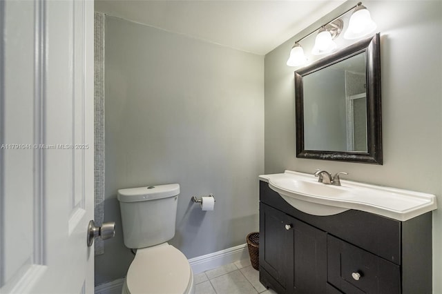 800 NE 195th St Unit 518, Miami, FL 33179 - bathroom with toilet, baseboards, tile patterned floors, and vanity