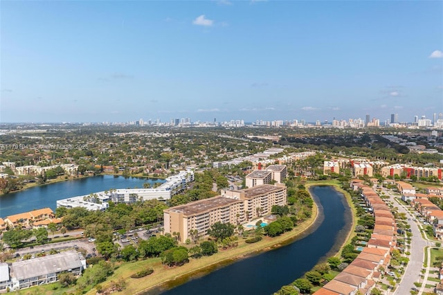 drone / aerial view with a view of city and a water view