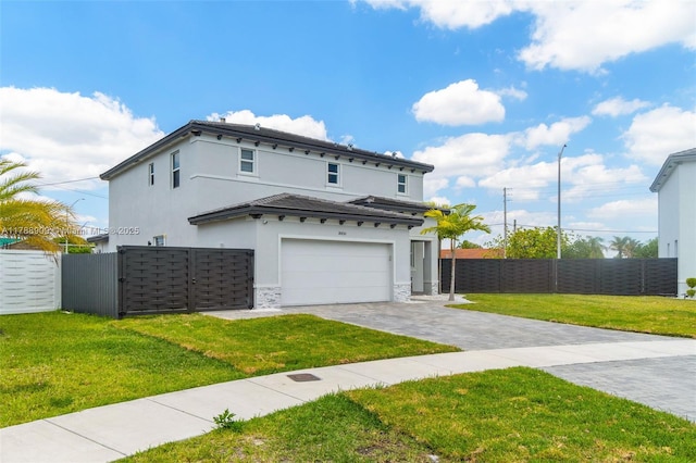 view of front of home featuring stucco siding, fence, decorative driveway, a garage, and a front yard