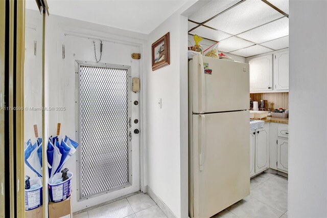 9281 Sunrise Lakes Blvd Unit 306, Sunrise, FL 33322 - entryway with light tile patterned floors