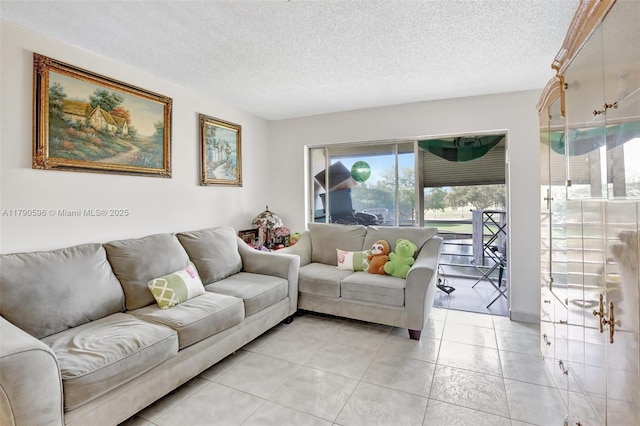 9281 Sunrise Lakes Blvd Unit 306, Sunrise, FL 33322 - living area with a textured ceiling and light tile patterned flooring