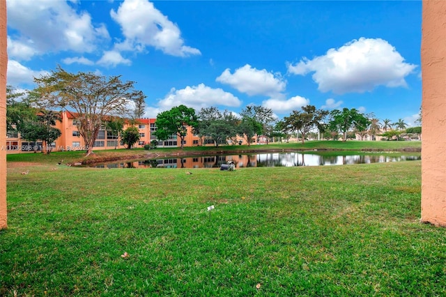 9281 Sunrise Lakes Blvd Unit 306, Sunrise, FL 33322 - view of green lawn with a water view