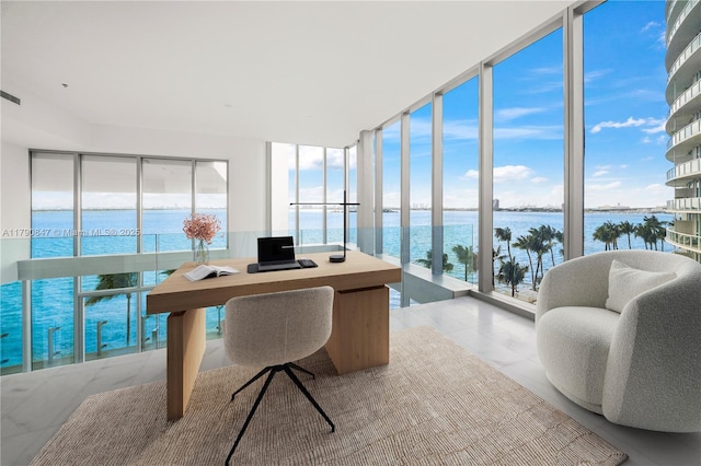 office with a water view and expansive windows