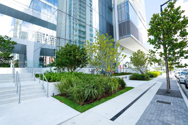 view of property's community featuring stairs