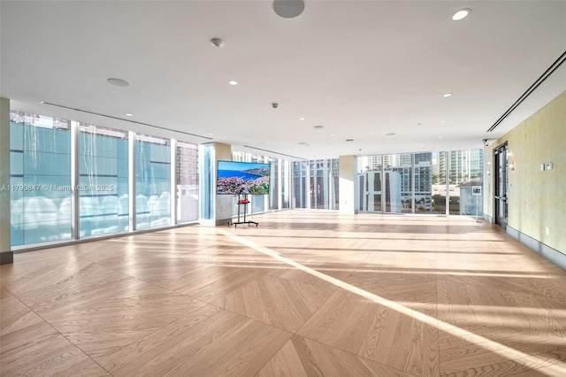 700 NE 26th Ter Unit Th-403, Miami, FL 33137 - spare room with a wall of windows and recessed lighting