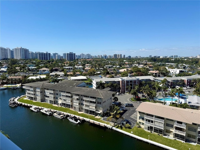 aerial view with a city view and a water view