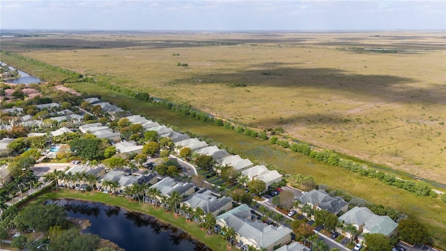 aerial view with a residential view and a water view