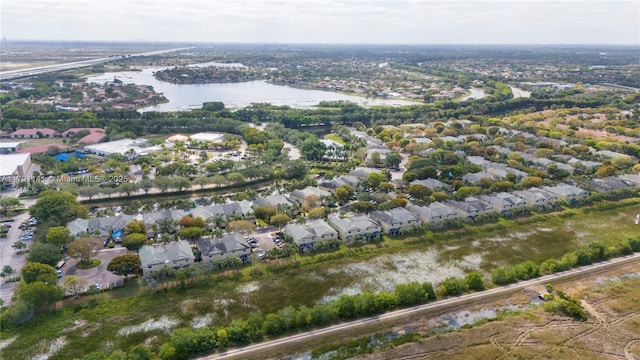 aerial view with a residential view and a water view