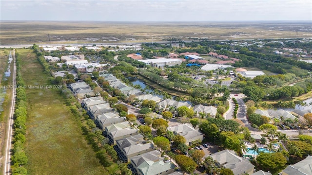 birds eye view of property with a residential view