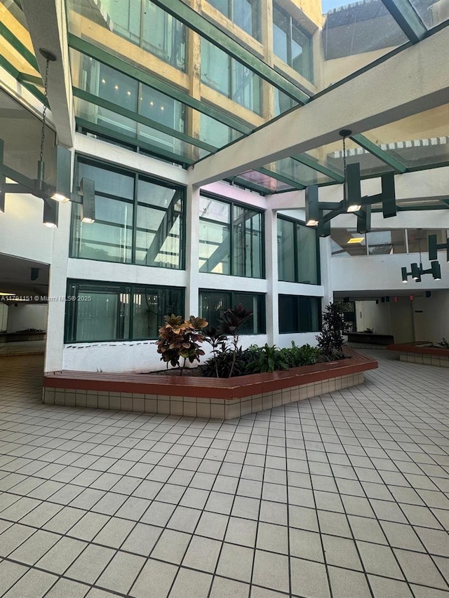 11750 SW 18th St Unit 406-1, Miami, FL 33175 - community lobby featuring a towering ceiling