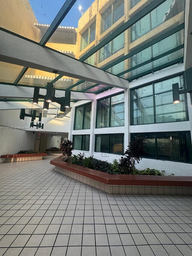 11750 SW 18th St Unit 406-1, Miami, FL 33175 - view of property exterior featuring a pergola and a patio area