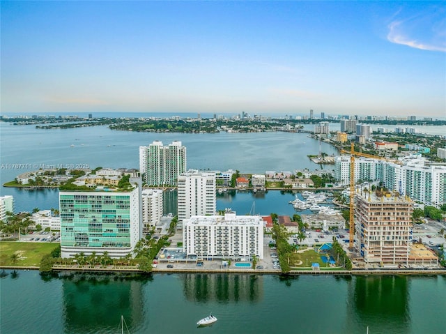 aerial view with a view of city and a water view