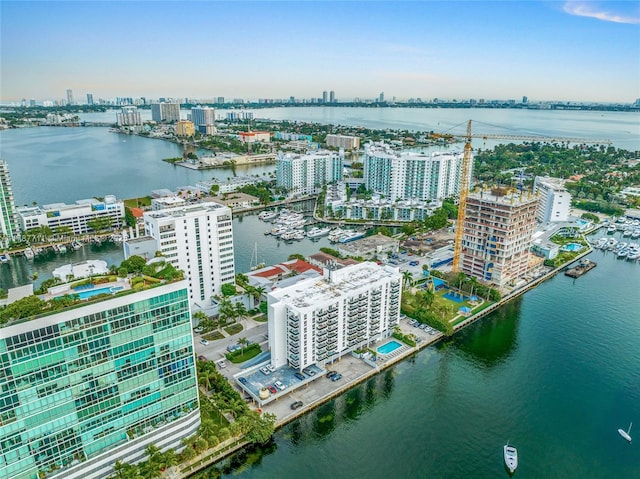 aerial view with a city view and a water view
