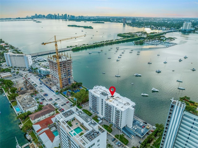 aerial view with a view of city and a water view