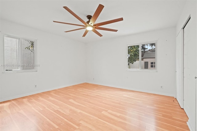 18982 Cloud Lake Cir, Boca Raton, FL 33496 - unfurnished bedroom featuring a ceiling fan, baseboards, and light wood-style flooring