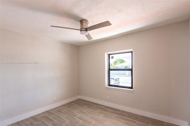 1710 E 6th Ave, Hialeah, FL 33010 - empty room featuring baseboards, a ceiling fan, and wood tiled floors