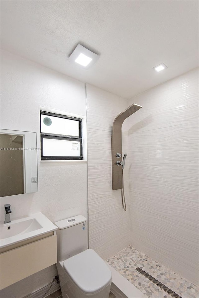 1710 E 6th Ave, Hialeah, FL 33010 - full bathroom with toilet, tiled shower, and vanity