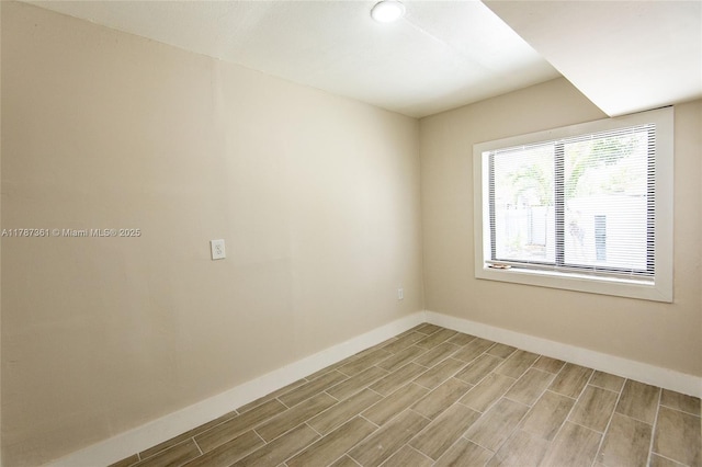 1710 E 6th Ave, Hialeah, FL 33010 - empty room with wood finished floors and baseboards