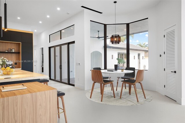 499 SW Squire Johns Ln, Palm City, FL 34990 - dining room with plenty of natural light