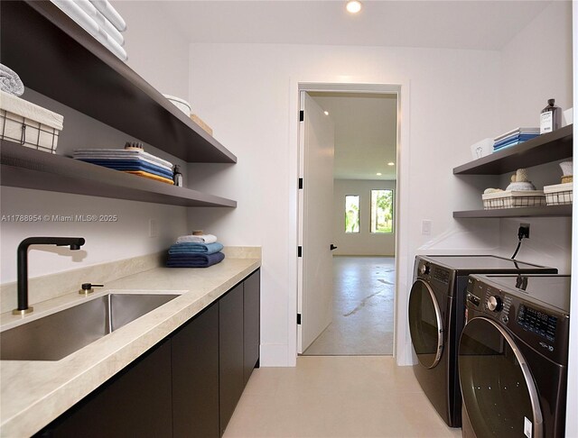 499 SW Squire Johns Ln, Palm City, FL 34990 - laundry area featuring washer and dryer and recessed lighting