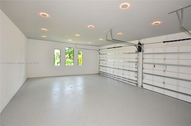 499 SW Squire Johns Ln, Palm City, FL 34990 - garage featuring recessed lighting