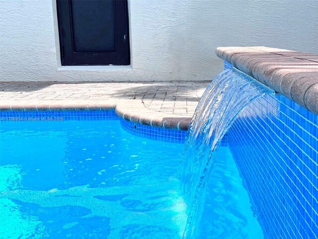499 SW Squire Johns Ln, Palm City, FL 34990 - view of outdoor pool