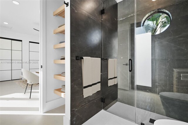 499 SW Squire Johns Ln, Palm City, FL 34990 - bathroom with a stall shower and recessed lighting