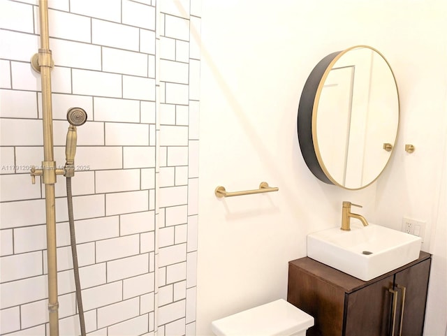 550 SW 13th Ave, Fort Lauderdale, FL 33312 - bathroom featuring toilet, tiled shower, and vanity