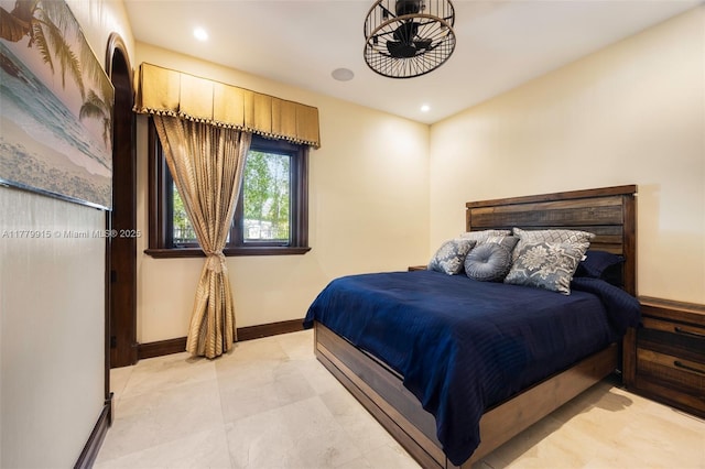 bedroom with recessed lighting and baseboards