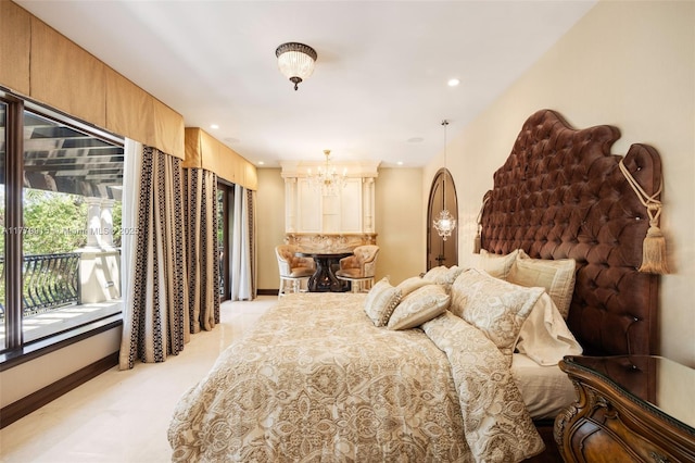 bedroom featuring an inviting chandelier, recessed lighting, and baseboards