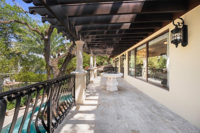 view of patio / terrace with a balcony