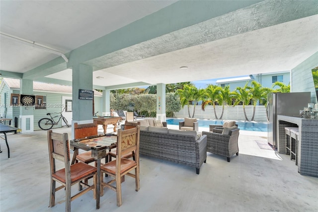 16 N Channel Dr, Key Largo, FL 33037 - view of patio featuring an outdoor hangout area, outdoor dining area, and an outdoor bar