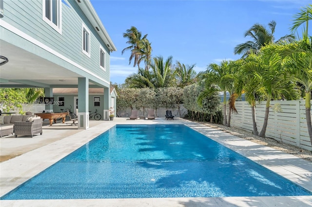 16 N Channel Dr, Key Largo, FL 33037 - view of pool with a patio, a fenced backyard, and an outdoor hangout area