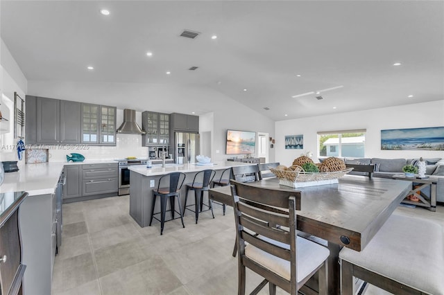16 N Channel Dr, Key Largo, FL 33037 - dining space with vaulted ceiling and recessed lighting