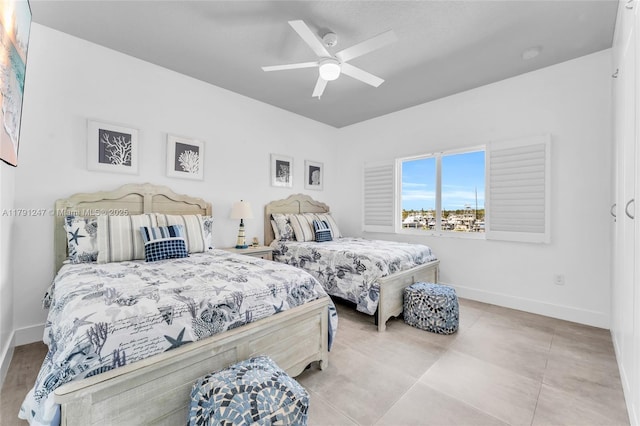 16 N Channel Dr, Key Largo, FL 33037 - bedroom featuring baseboards, a ceiling fan, and tile patterned floors