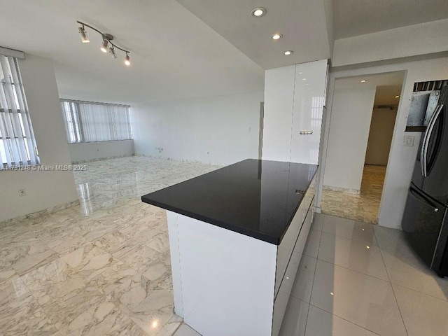18051 Biscayne Blvd Unit 1704, Aventura, FL 33160 - kitchen featuring a kitchen island, freestanding refrigerator, open floor plan, recessed lighting, and modern cabinets