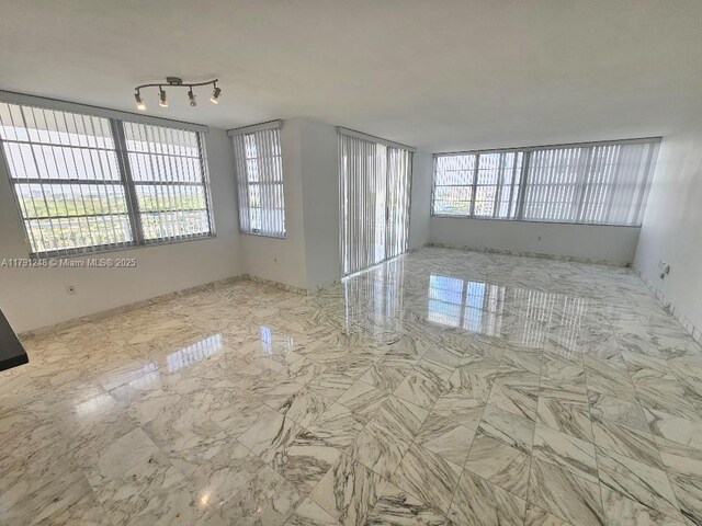 18051 Biscayne Blvd Unit 1704, Aventura, FL 33160 - unfurnished room with marble finish floor