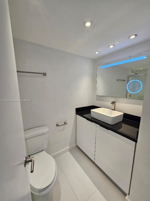 18051 Biscayne Blvd Unit 1704, Aventura, FL 33160 - bathroom with recessed lighting, tile patterned flooring, toilet, vanity, and baseboards